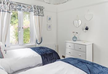 Beautifully decorated, bedroom 2 provides the perfect place to rest your head at night.