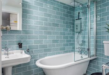 Choose between a relaxing bath or an invigorating shower to start the day.