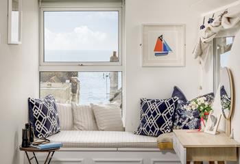 Watch the boats float past in the cosy window seat in bedroom 3.