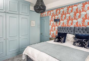 Shades of blue create a calming room to drift off in.
