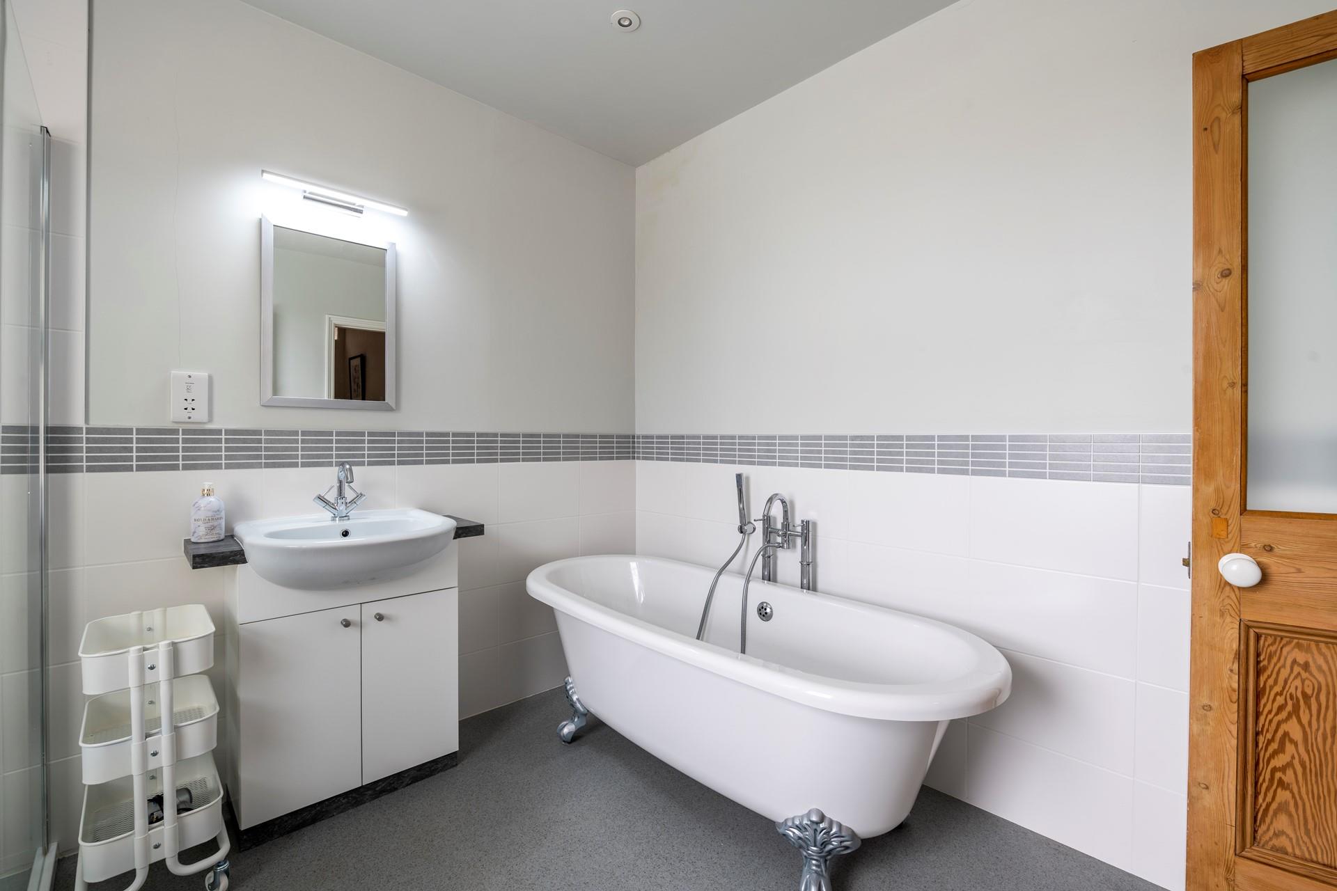 Indulge in a long soak in the roll-top bath on a chilly winter evening.