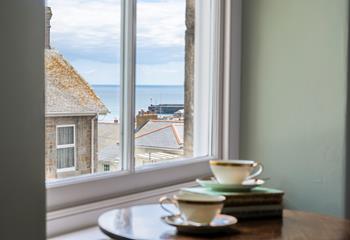 Enjoy sea glimpses in the bedrooms upstairs.