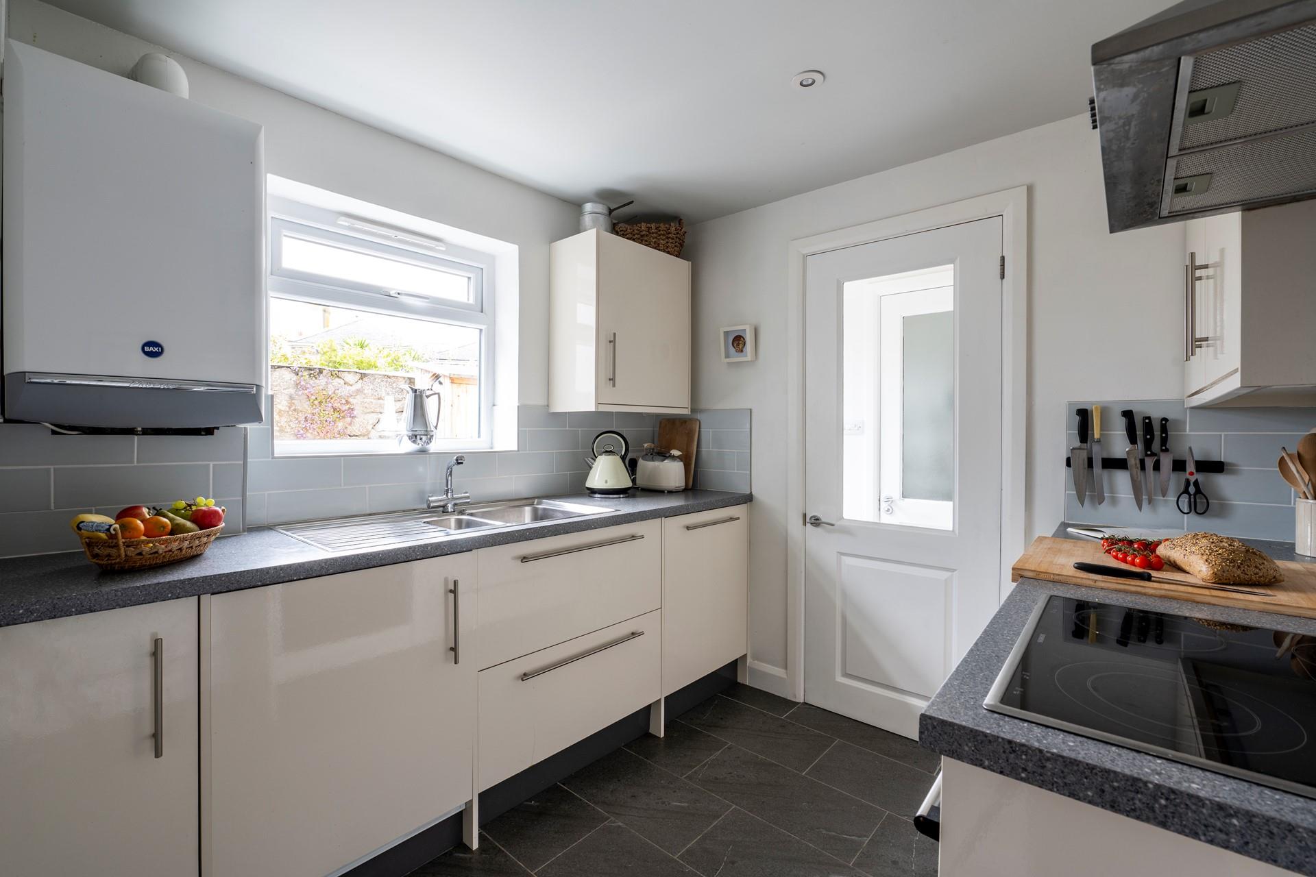 Let the chef of the family cook up a storm in the well-equipped kitchen.