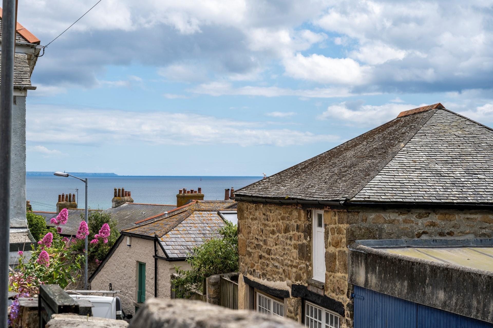 Gaze at the sea view over the quirky rooftops.