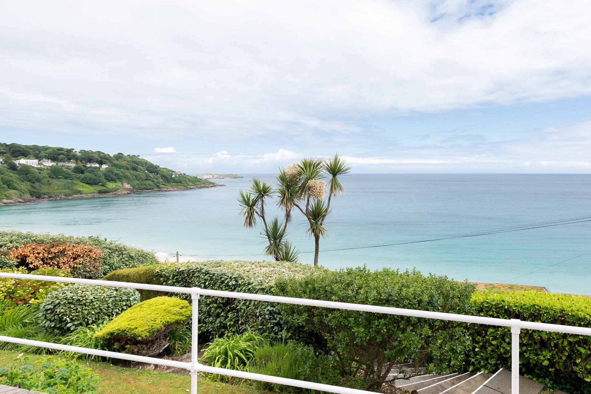 Wander down the path to the beach and take an early morning dip in the turquoise waters.