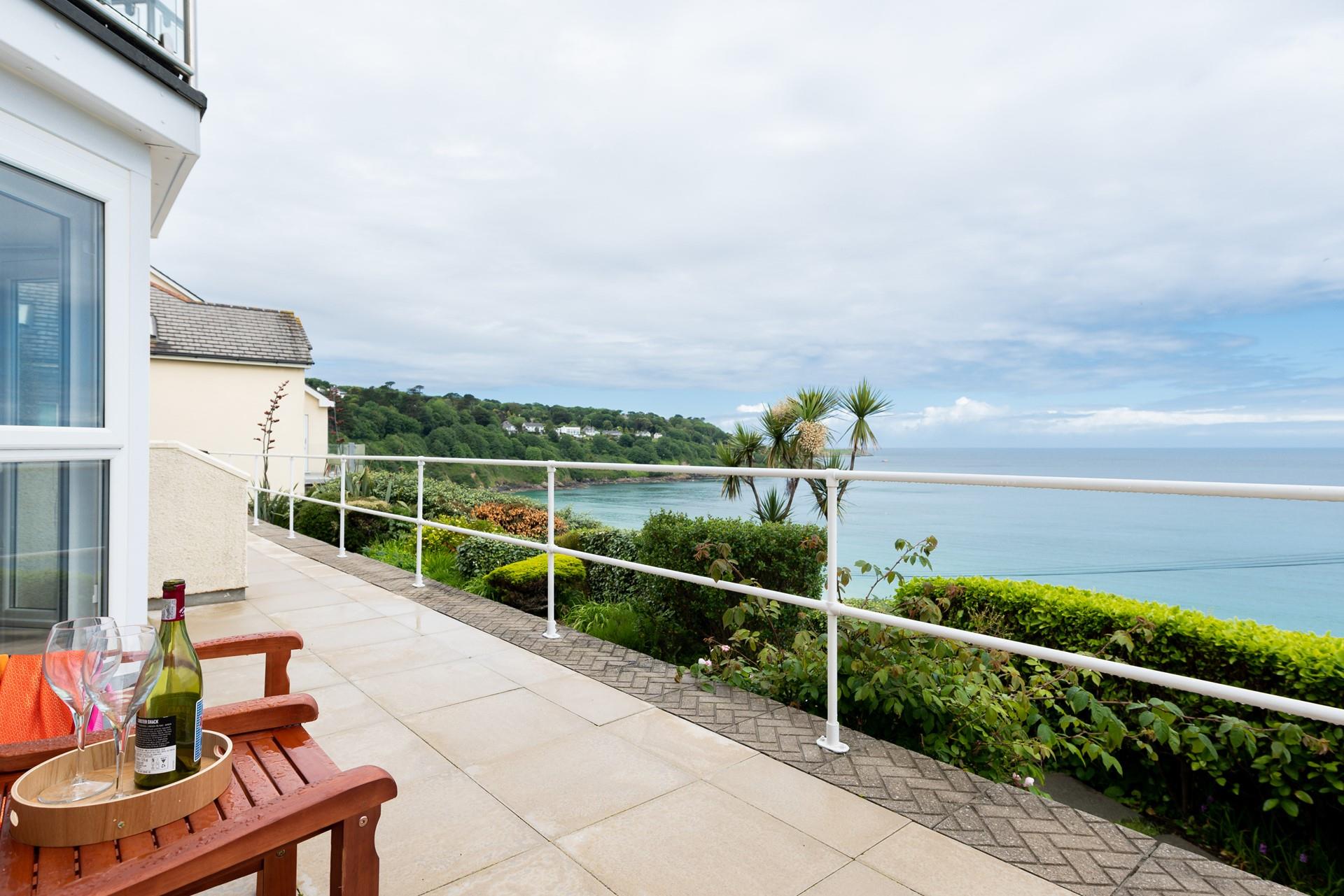 Open a bottle of wine to sip on the patio watching the waves in the Bay.