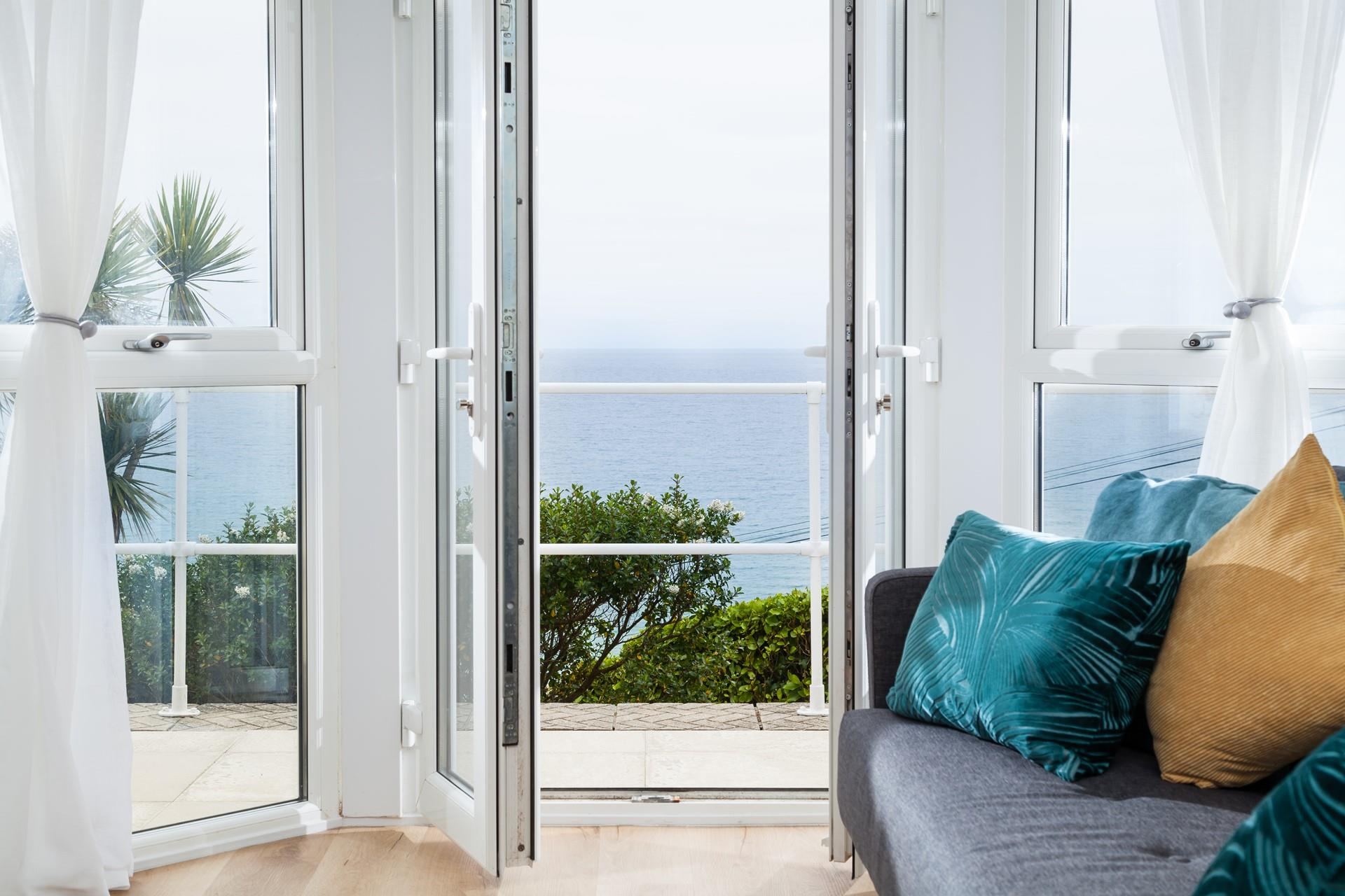 Sink into the plush sofa with a class of something cold and watch the sun come down.