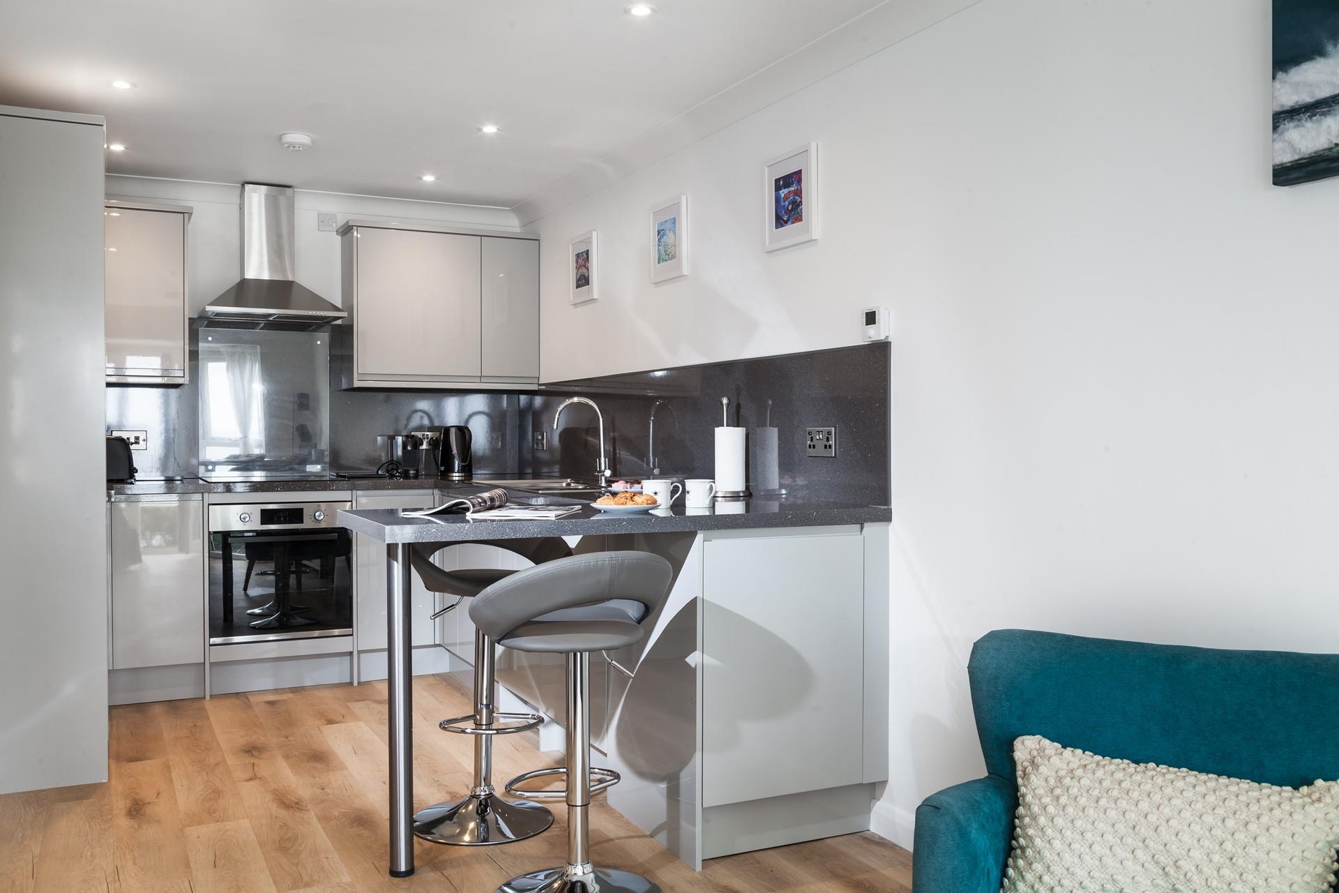 The modern and sleek kitchen is perfect for cooking tasty romantic meals.