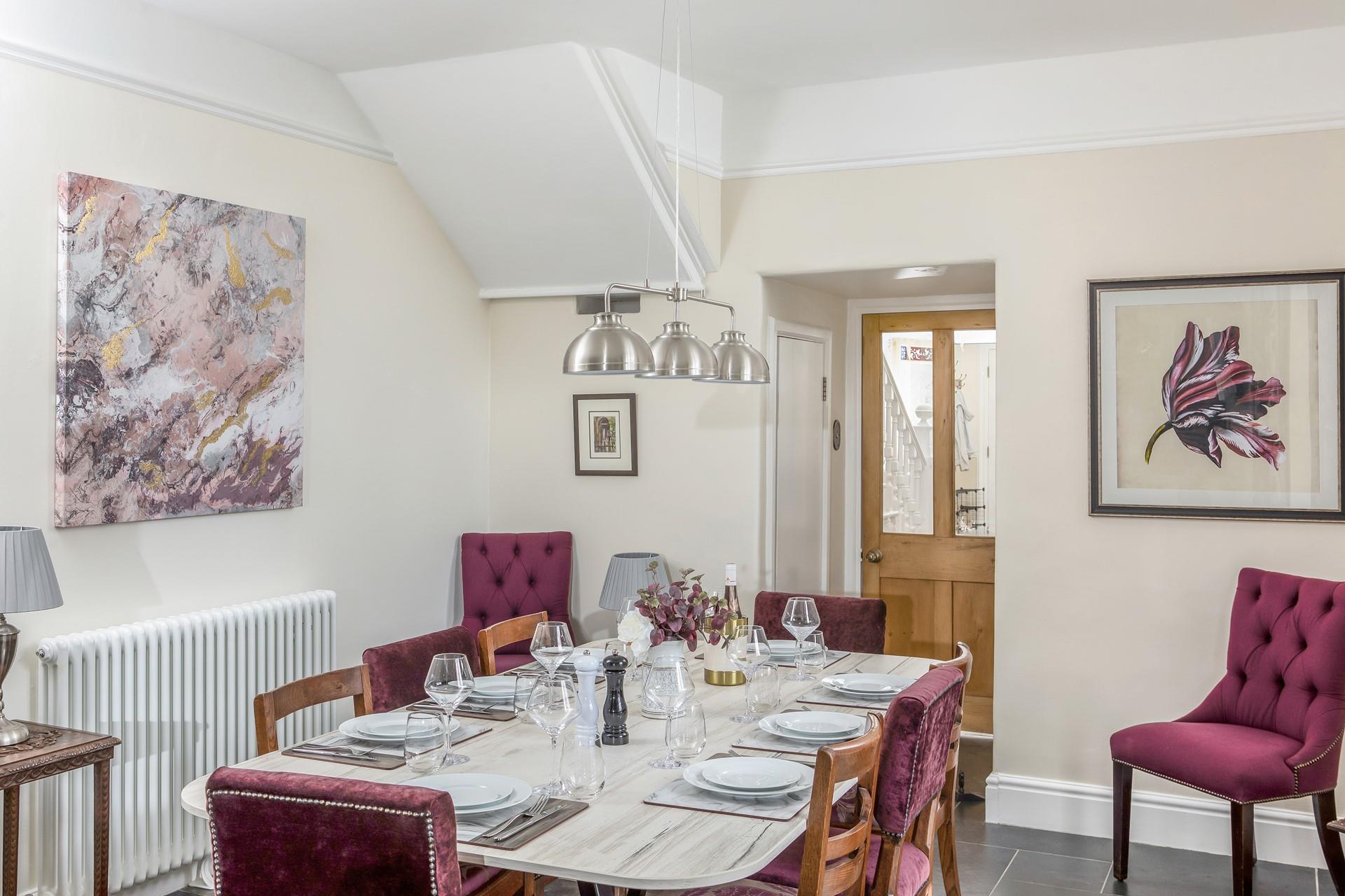 Sit around the handcrafted Dekton dining table and tuck into a feast.