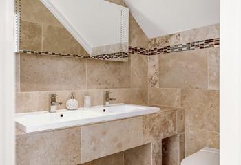 The stylish en suite is perfect for getting ready for an evening out.