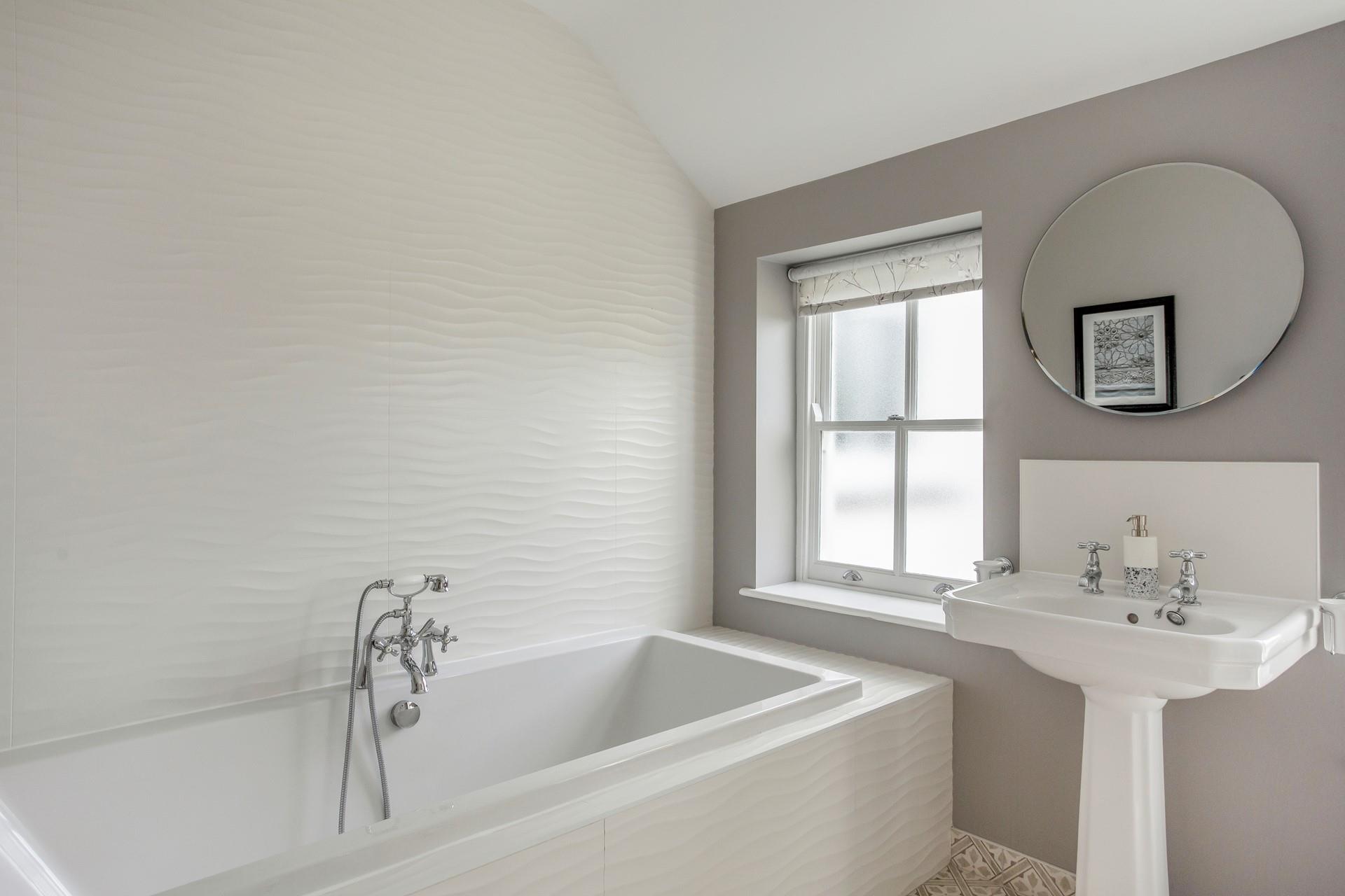 Run a deep bath full of bubbles to relax and unwind in the evening.