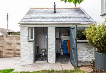 The outhouse is the perfect space for storing surfing, bodyboard and wetsuit gear.