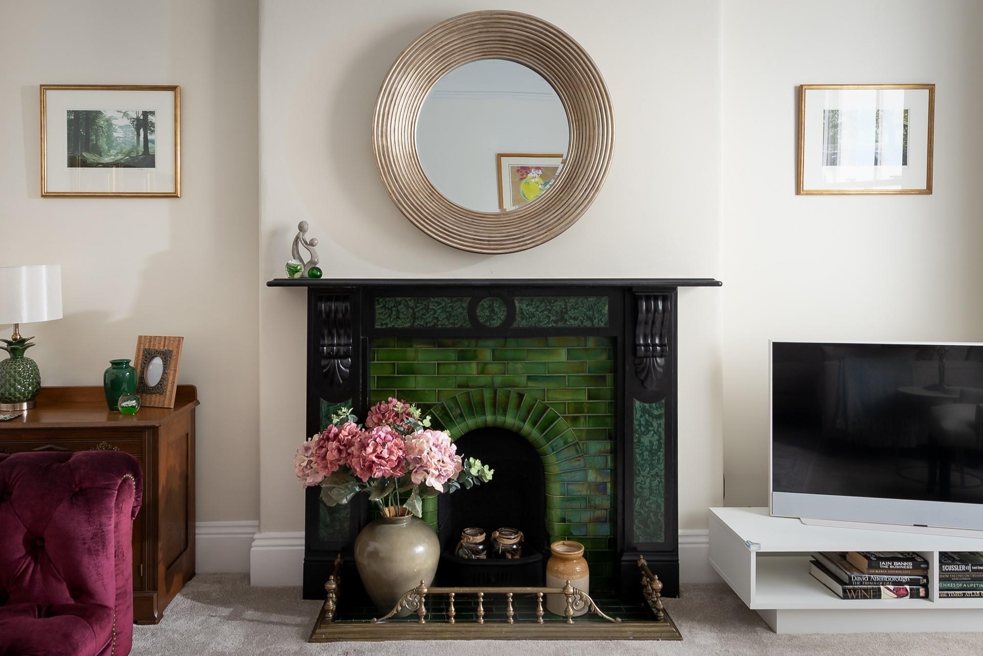 Stylishly decorated, the second sitting room is the perfect place to spend quality time as a family.