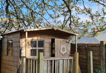 Let the kids have fun in the playhouse whilst you soak up the sun in the garden.
