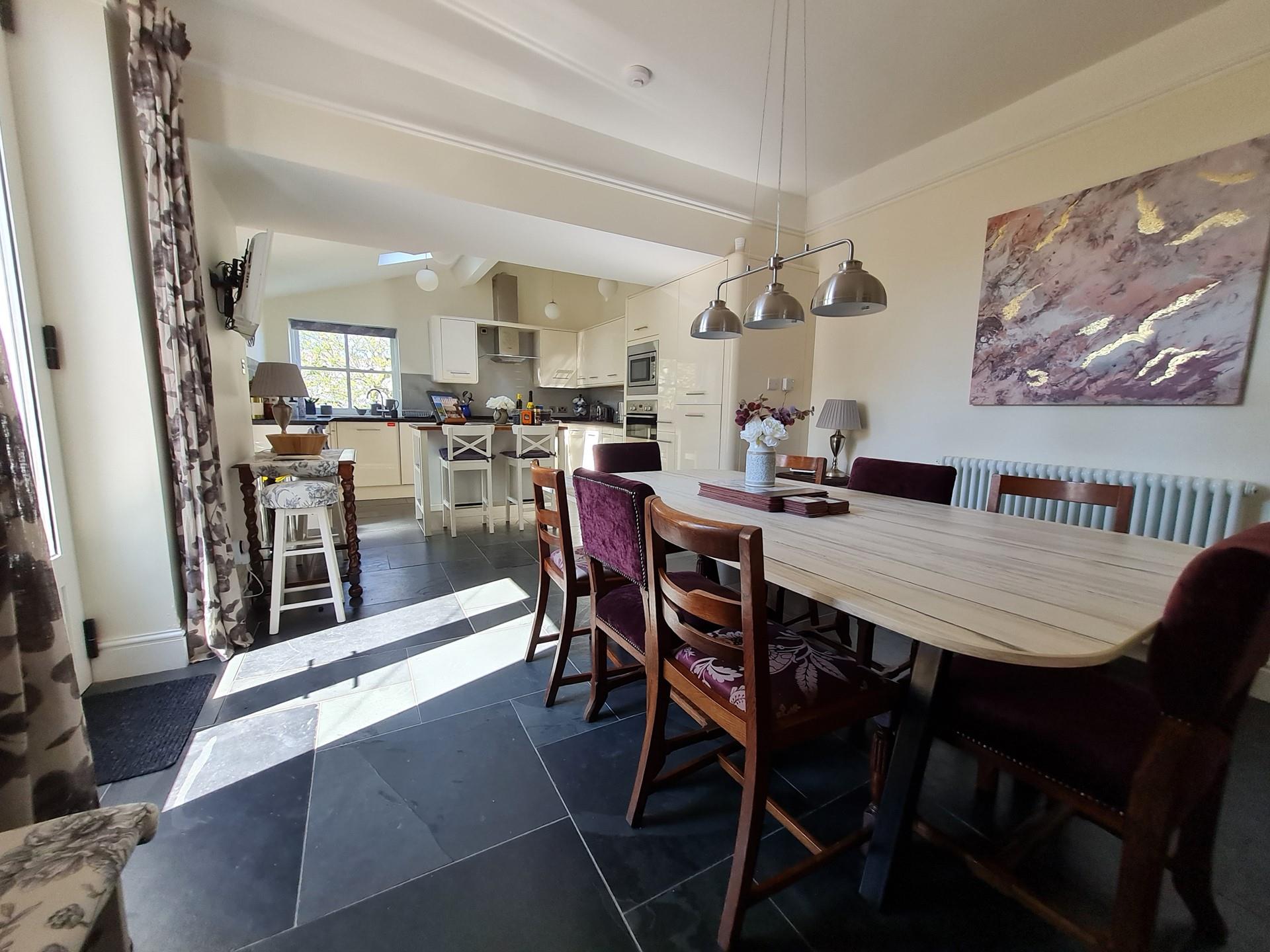 Light fills the open plan kitchen and dining space.