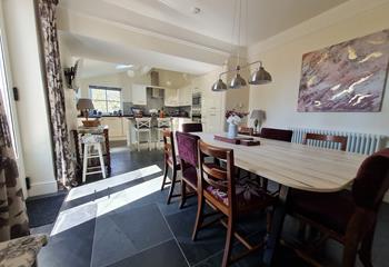 Light fills the open plan kitchen and dining space.