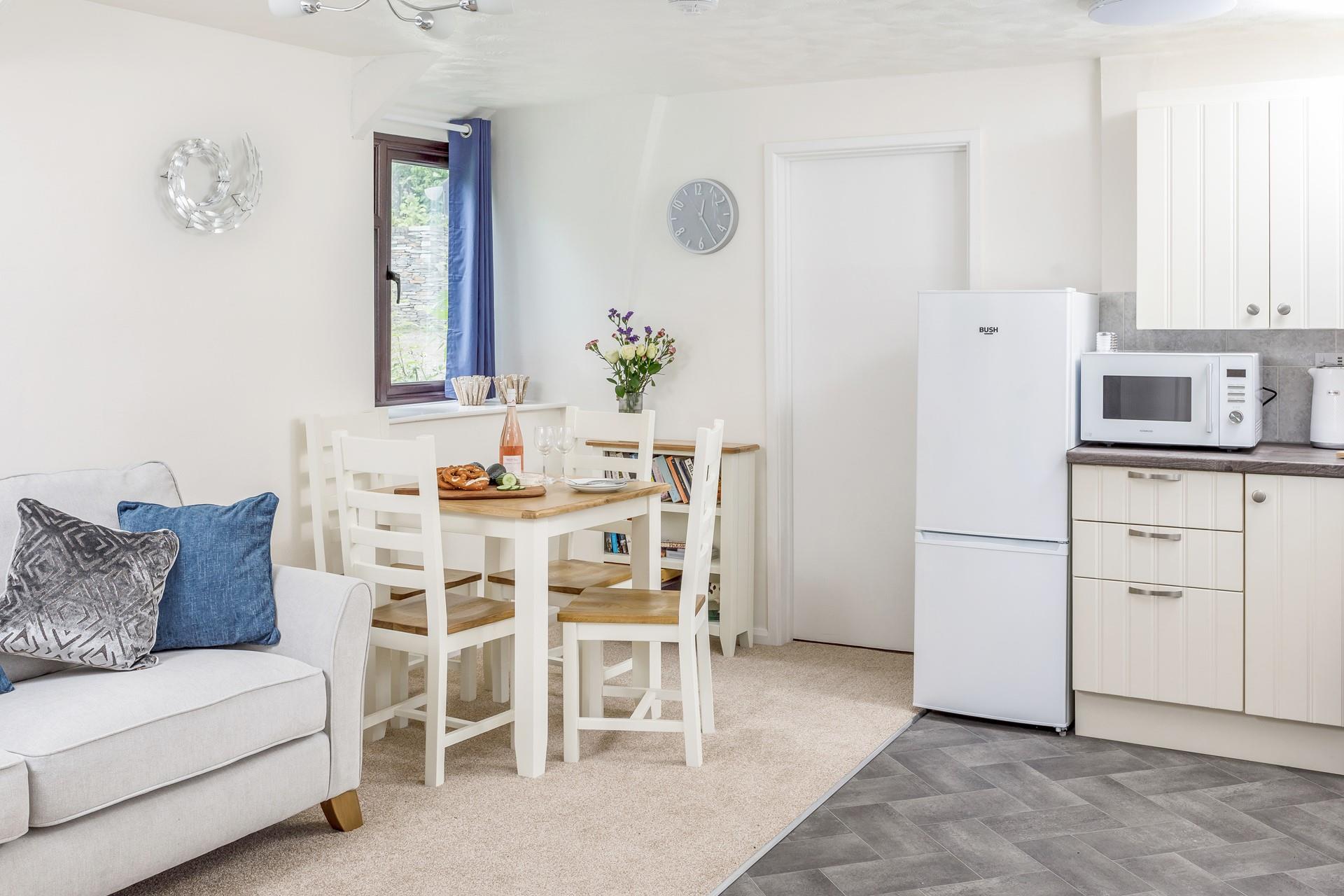 After enjoying a tasty meal snuggle up in the sitting area and put on a feel-good film.