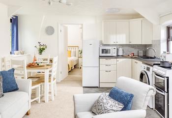This homely cottage for 4 has a cosy open plan living area for dining and relaxing together.