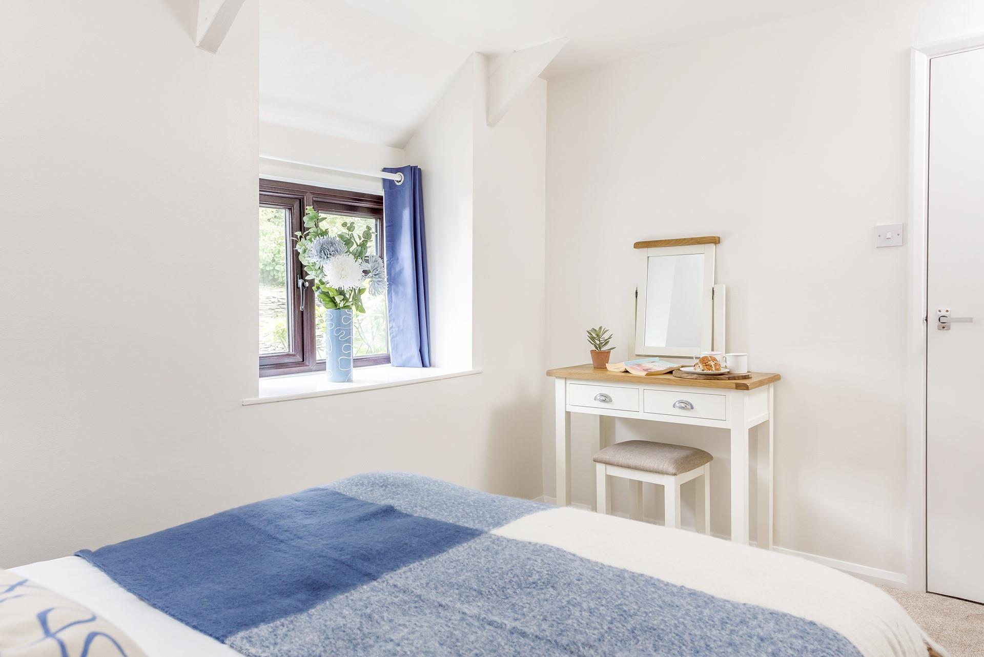 Get ready at the dressing table for a day of exploring Cornwall.