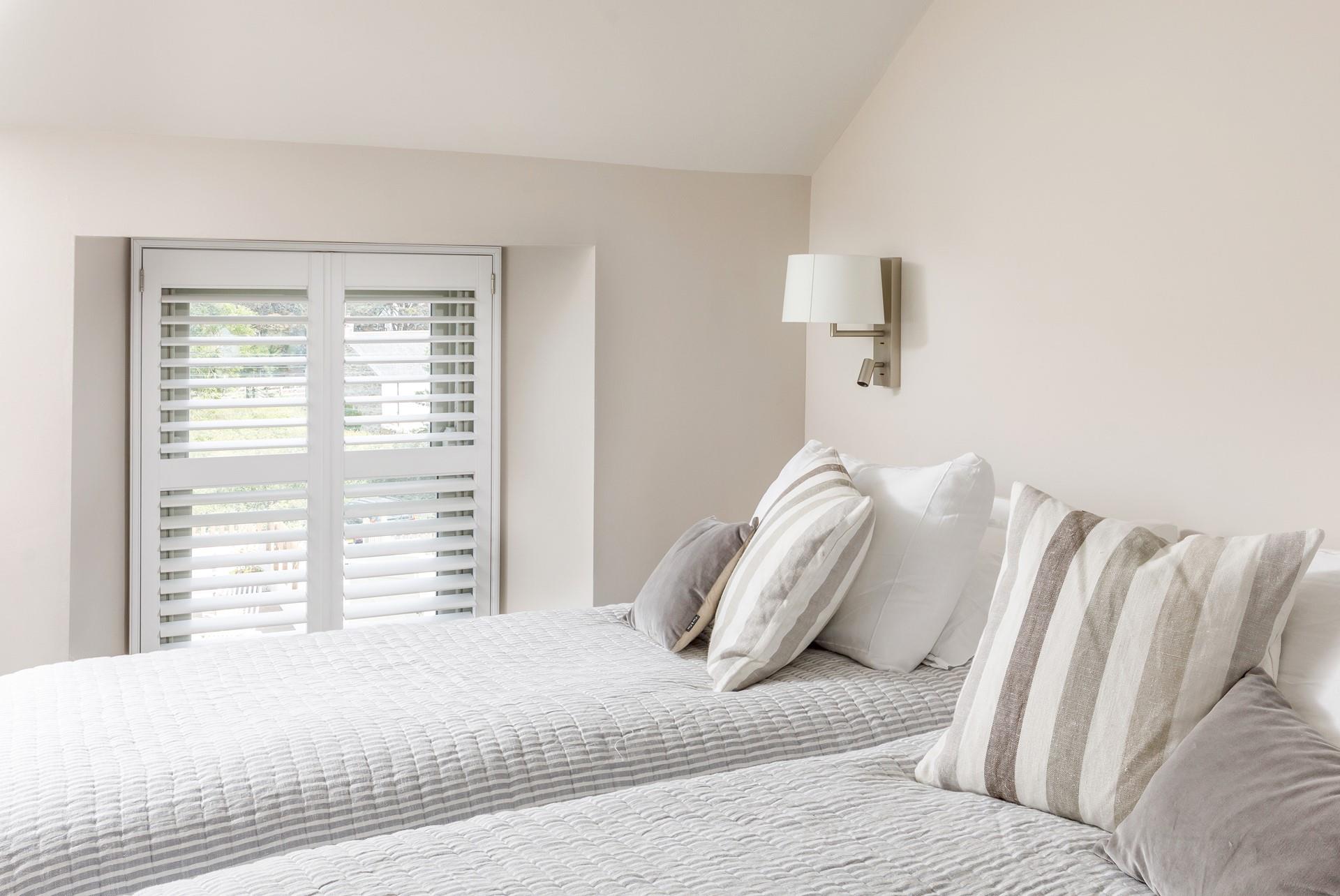 Zip and link beds in bedroom 2, makes Spring Cottage ideal for both children and adults. 