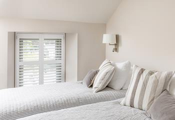 Zip and link beds in bedroom 2, makes Spring Cottage ideal for both children and adults. 