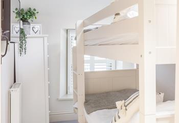 Children can enjoy a sleepover together and rest easy in the bunk beds in bedroom 3. 