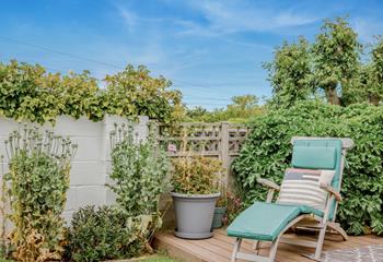 A garden chair is perfect to sit in if you want to catch a tan on a relaxing sunny day.