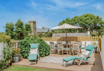 When the sun shines, the decking provides a superb place for al fresco dining with a pretty view of the church. 