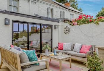 What better way to spend an evening, than relaxing with a book on the comfortable patio furniture?