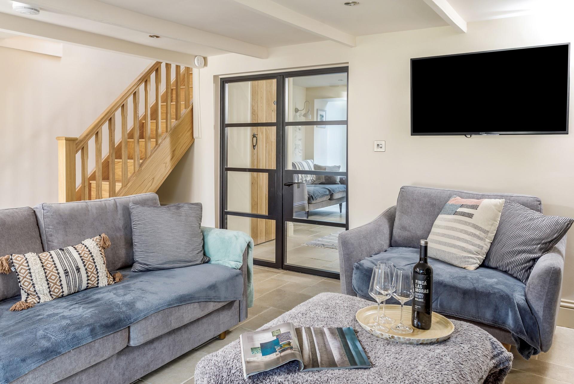 The stairs lead from the sitting room to all the bedrooms and family bathroom upstairs. 