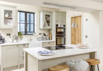 A gorgeous modern kitchen, where you can sit and make the most of family time together.