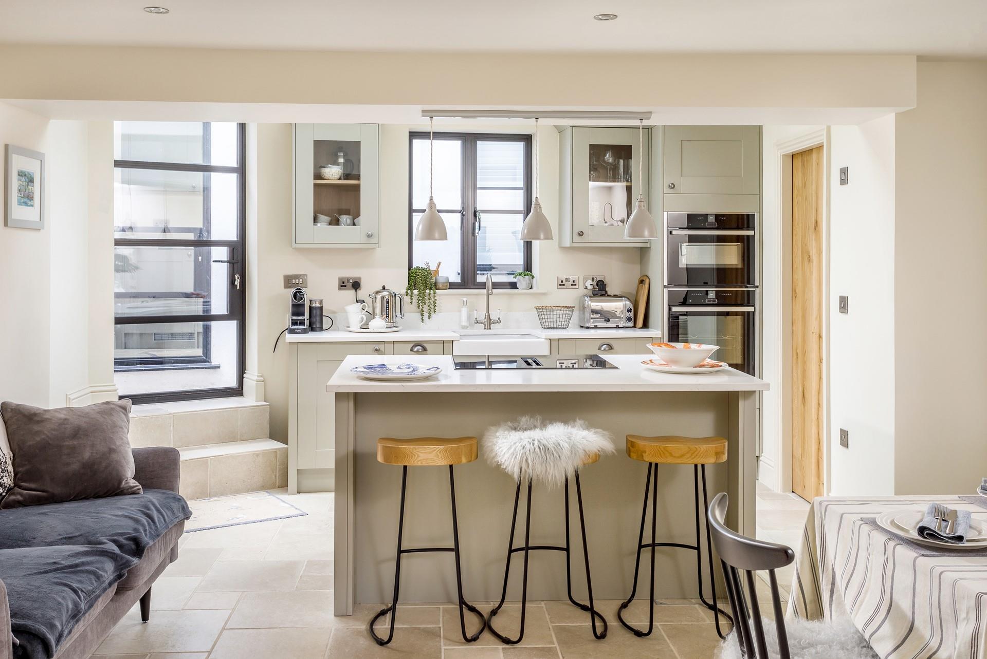 The large windows in the kitchen provides plenty of natural light. 