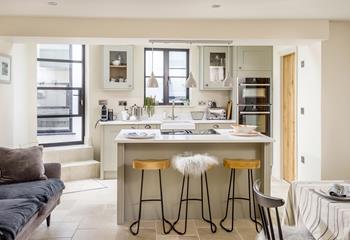 The large windows in the kitchen provides plenty of natural light. 