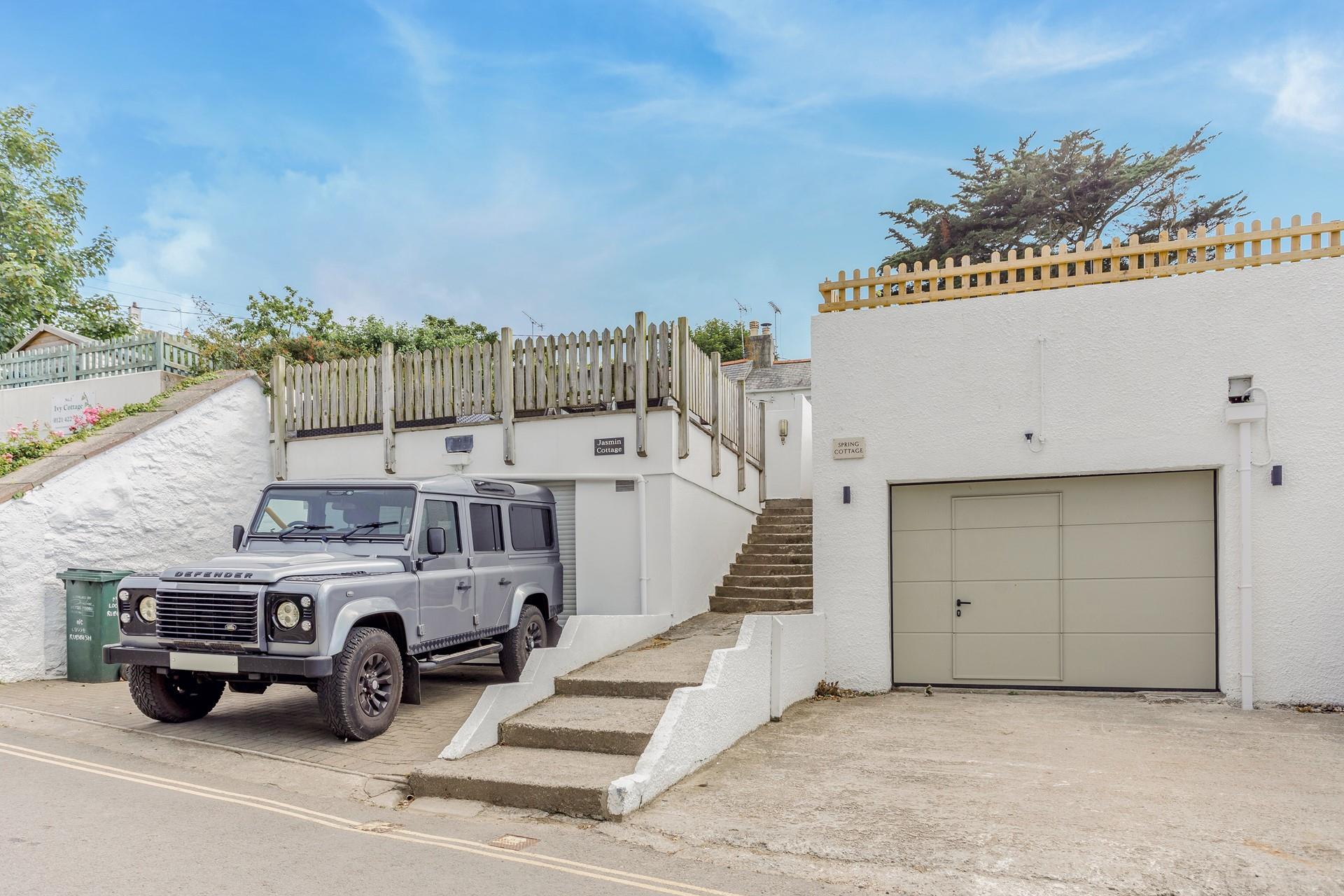 A spacious garage that is perfect for storing your car.