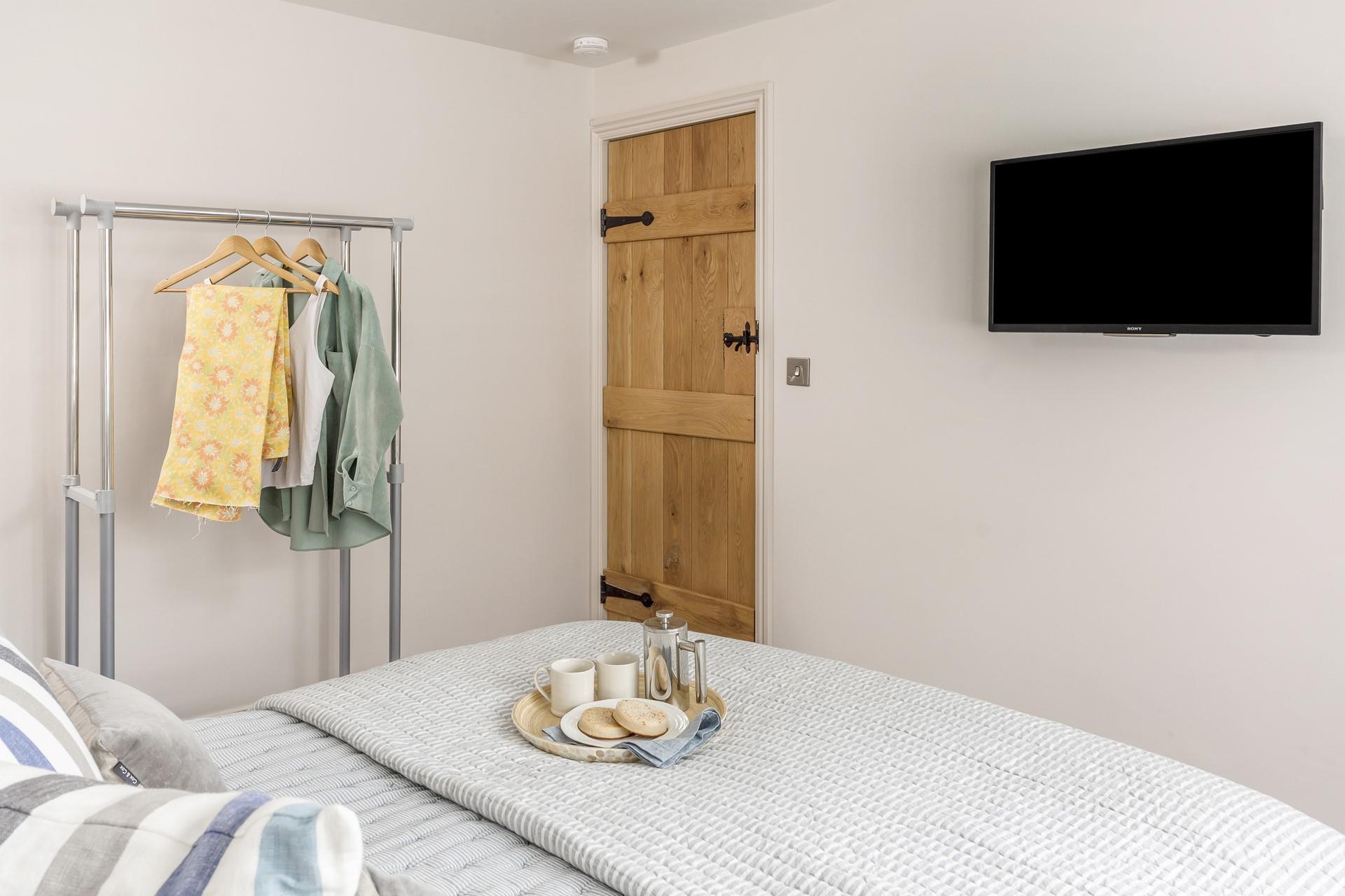 Each bedroom has gloriously comfy beds and a TV, perfect for a lazy morning.