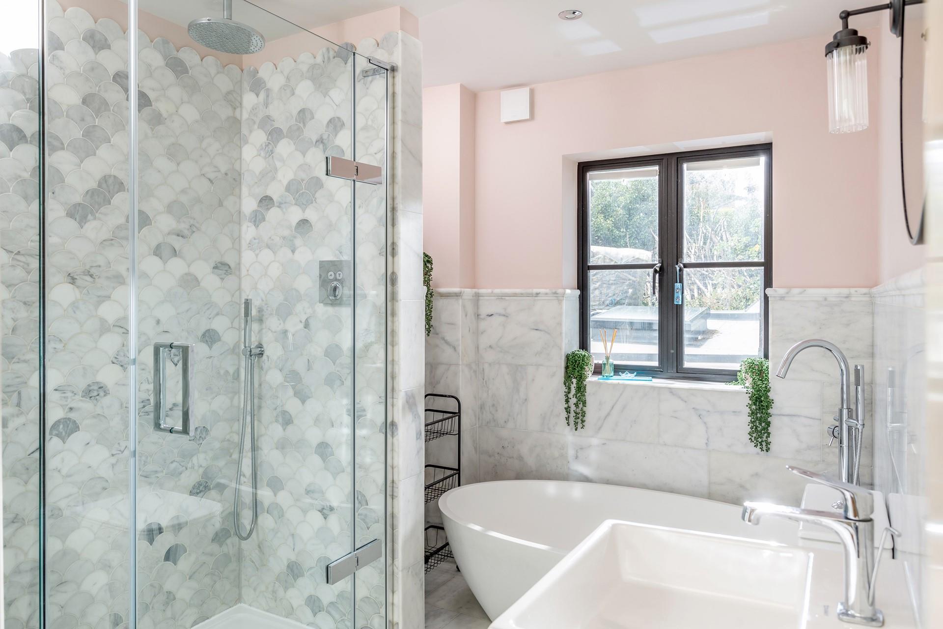 A gorgeously decorated bathroom where you can enjoy a hot shower or bath to relax after a fun day.
