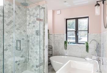 A gorgeously decorated bathroom where you can enjoy a hot shower or bath to relax after a fun day.