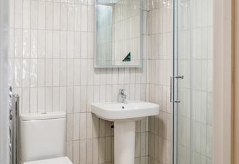 The shower room provides ample space to get ready for the day.