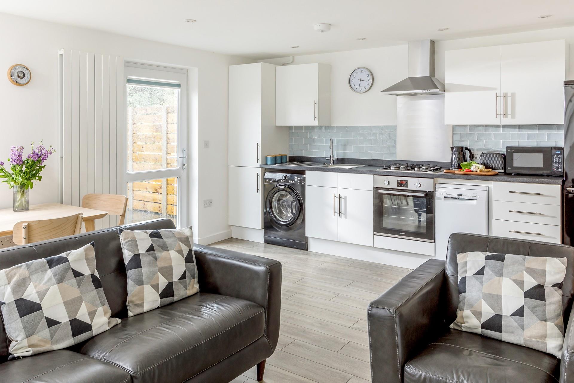  The open living space is bright and airy for the whole family to relax in.