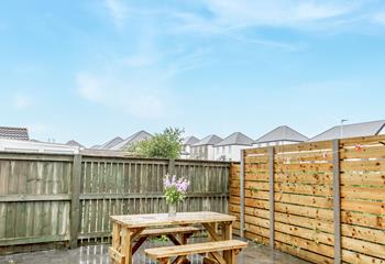 Dine al fresco on a sunny evening in the garden.