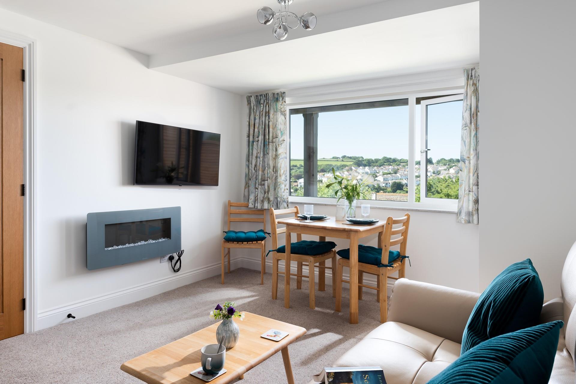 After a day exploring the beautiful south coast, come back to relax in the sitting room.