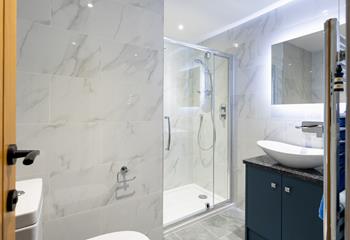 The bathroom is modern and finished to a high standard providing a lovely space to get ready.