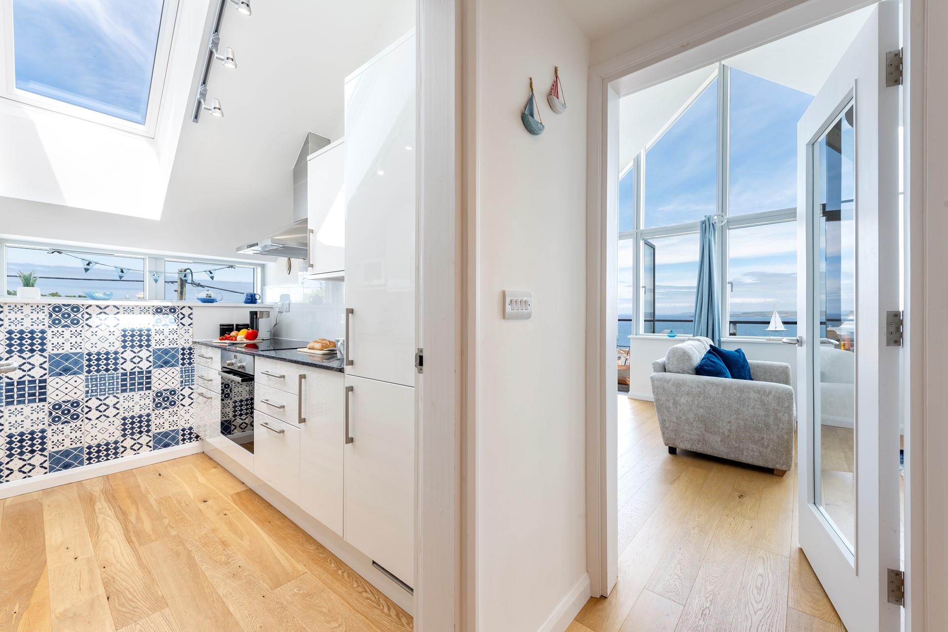 The apartment has been finished to a high standard and decorated with a blue seaside theme.