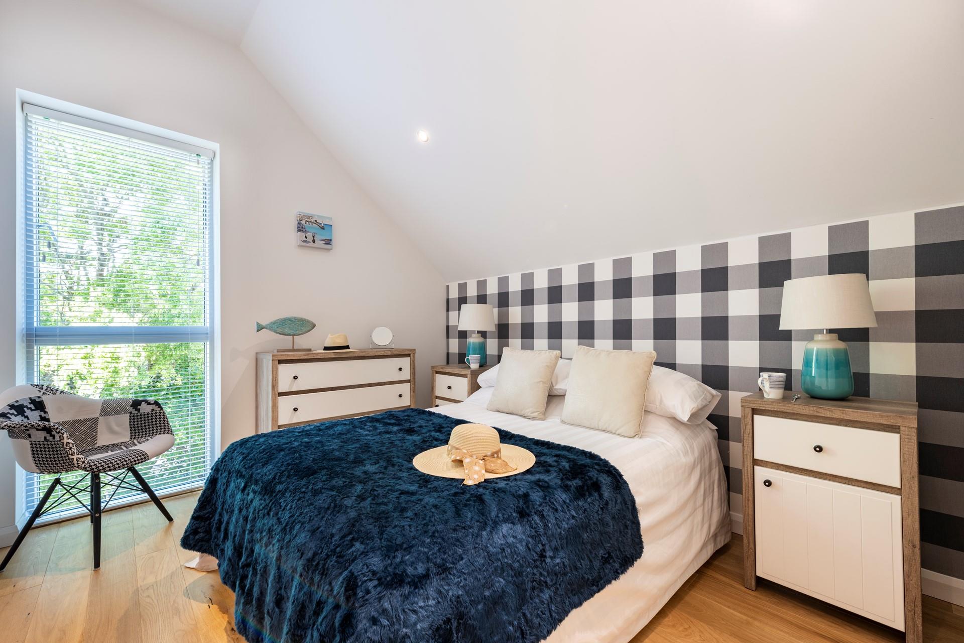 Bedroom 1 has a spacious double bed providing a cosy night's sleep.