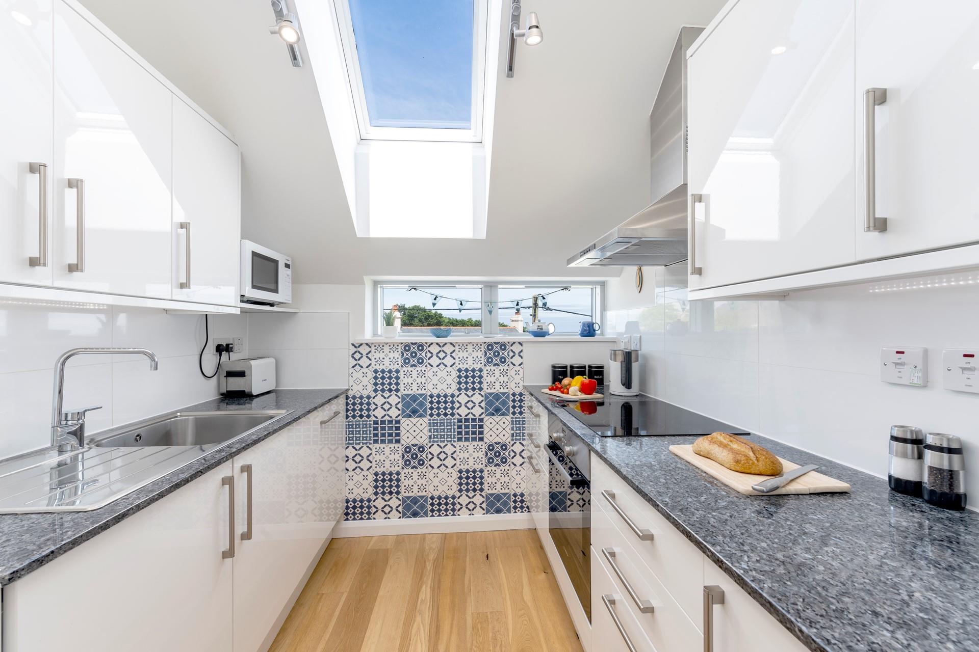 The kitchen is fully equipped for cooking tasty meals.