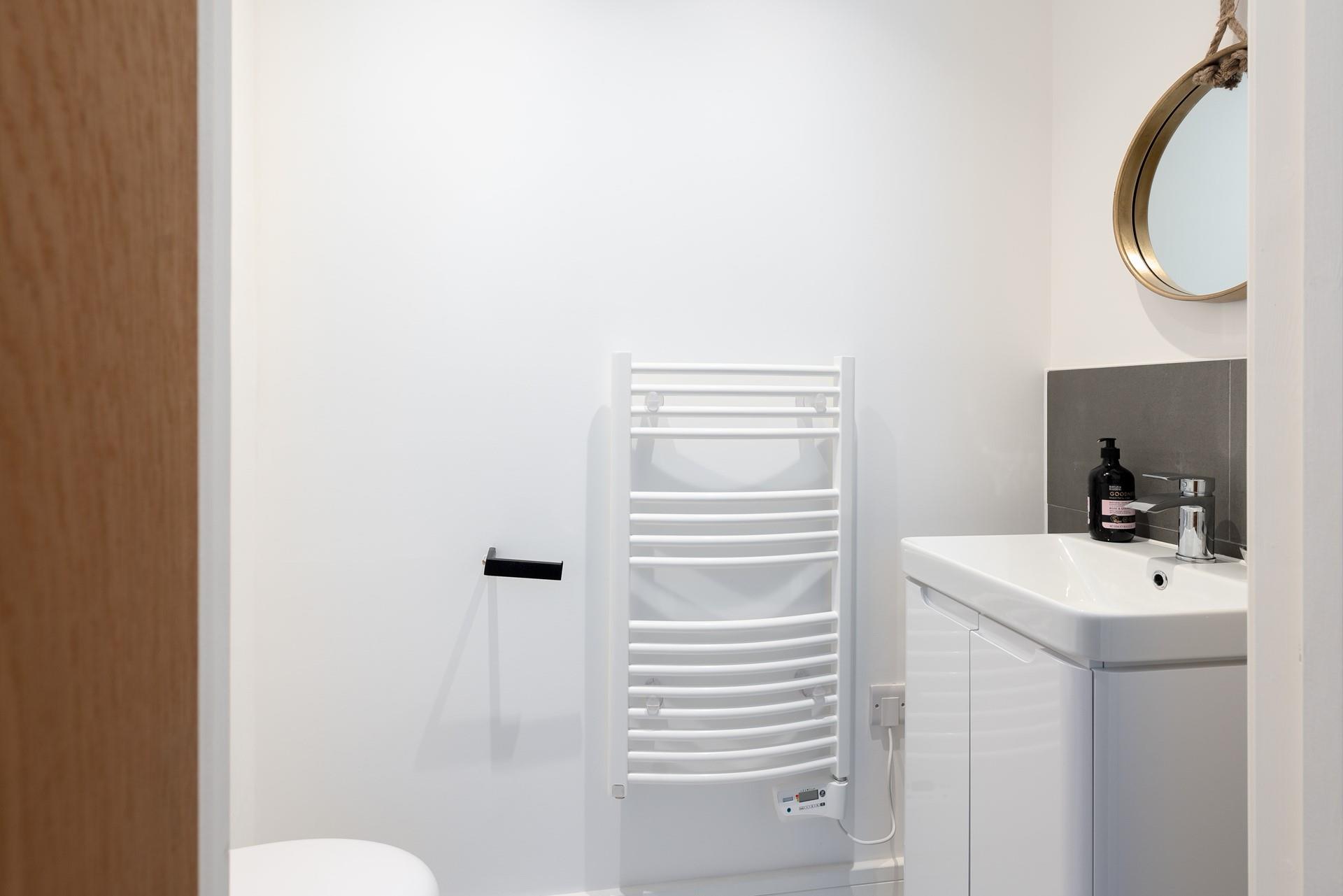 The downstairs cloakroom has a WC and basin.