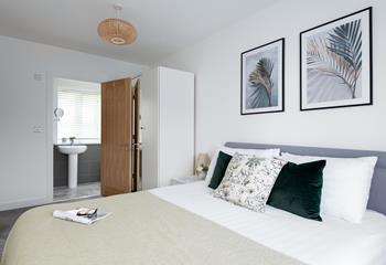 The stylish bedroom has a king size bed and en suite providing a relaxing base to return to.