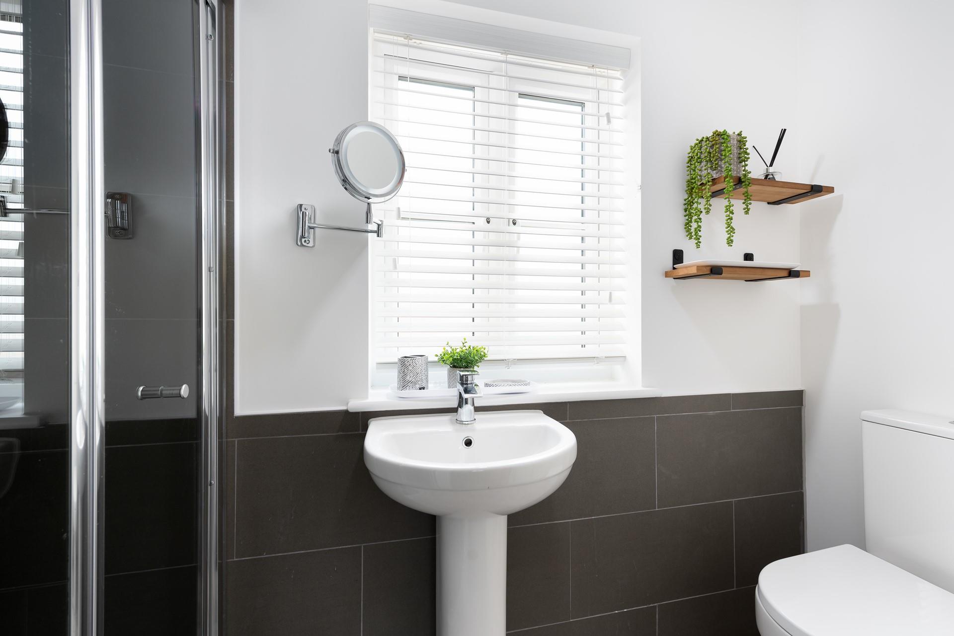 Get ready for the day in the en suite.