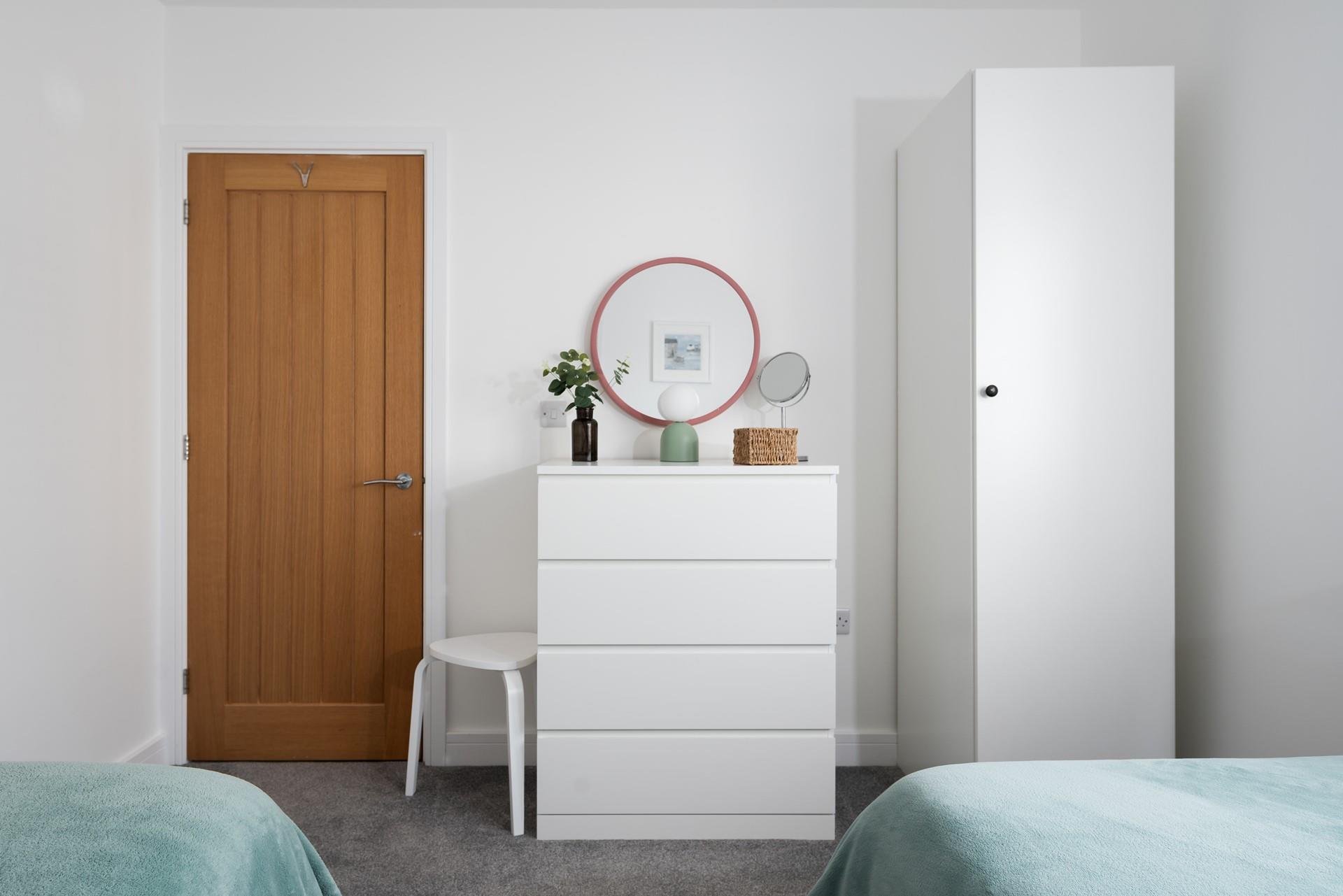 There are modern furnishings in bedroom 2.