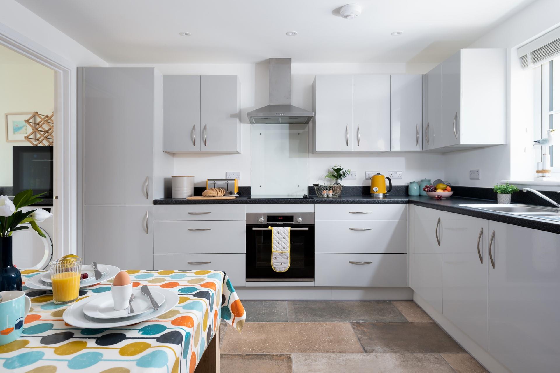 The kitchen is modern and fully equipped for cooking tasty meals.